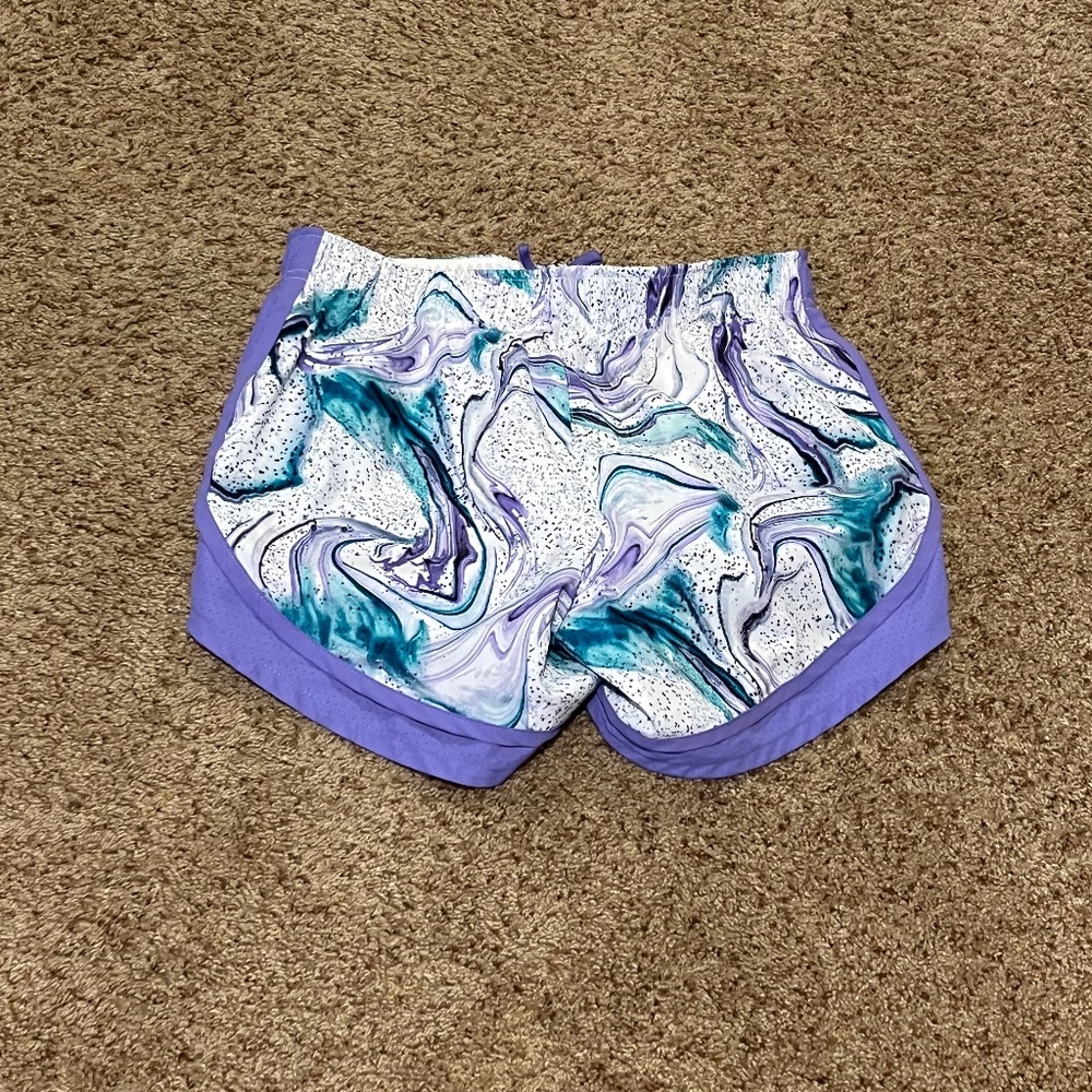 Woman’s marbled colored athletic running shorts